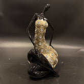 Modern Figurine Of seated Woman