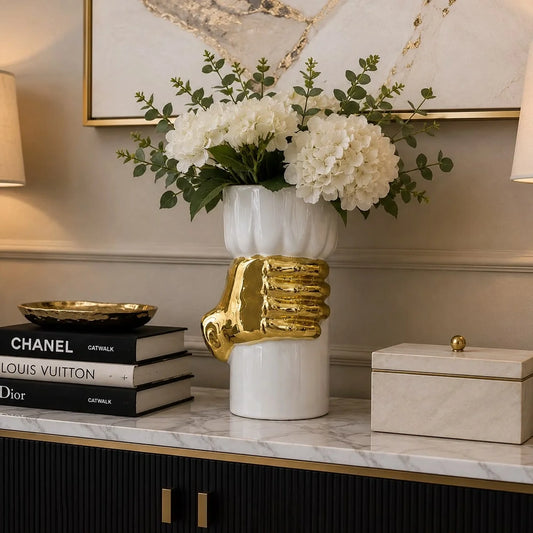 Statement vase featuring a glossy white finish